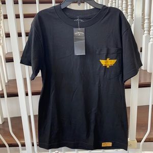 Back primitive T-shirt with yellow logo